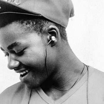 African American male listening to music on ipods