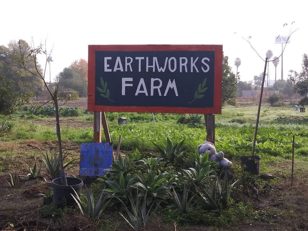 EarthWork Farm sign
