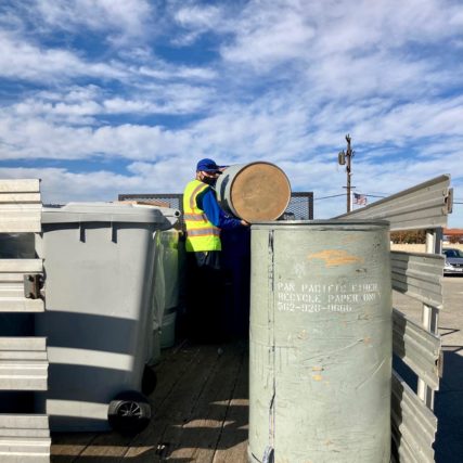 Boy Emptying barrels